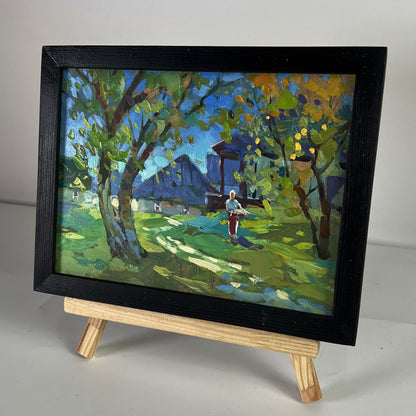 Oil painting Near the village houses by Yuriy Suprunchuk in black frame