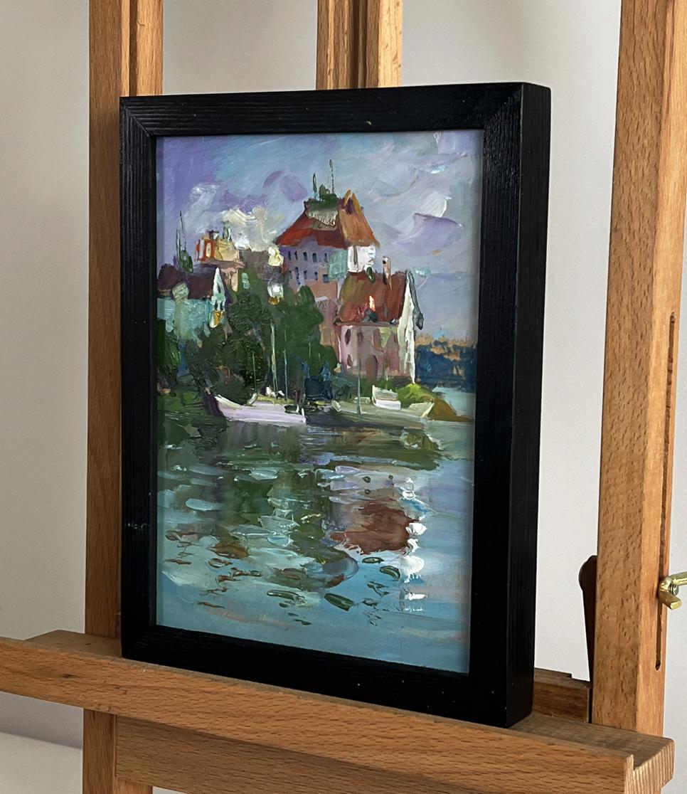 Framed oil painting of houses by the river by Yuriy Suprunchuk