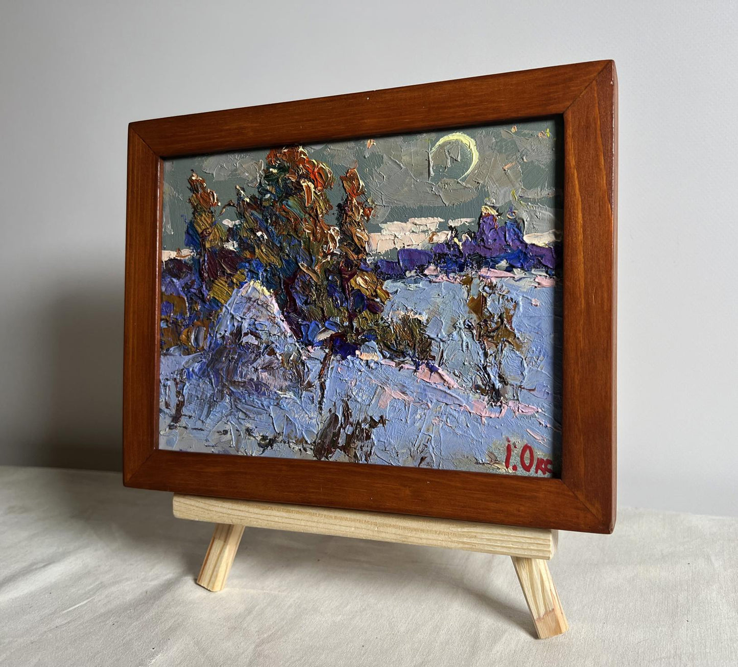 Textured impressionist snowy landscape oil painting by Oksana Ivanyuk in wooden frame