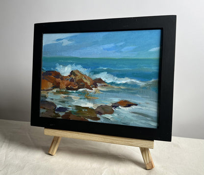 Framed oil painting by Yuriy Suprunchuk of waves crashing on rocks