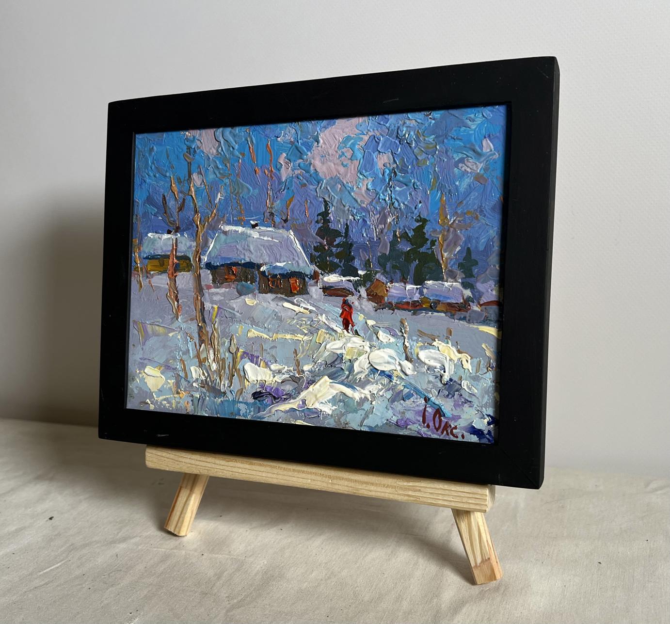 Black-framed Oil painting On a frosty day by Oksana Ivanyuk snowy village scene