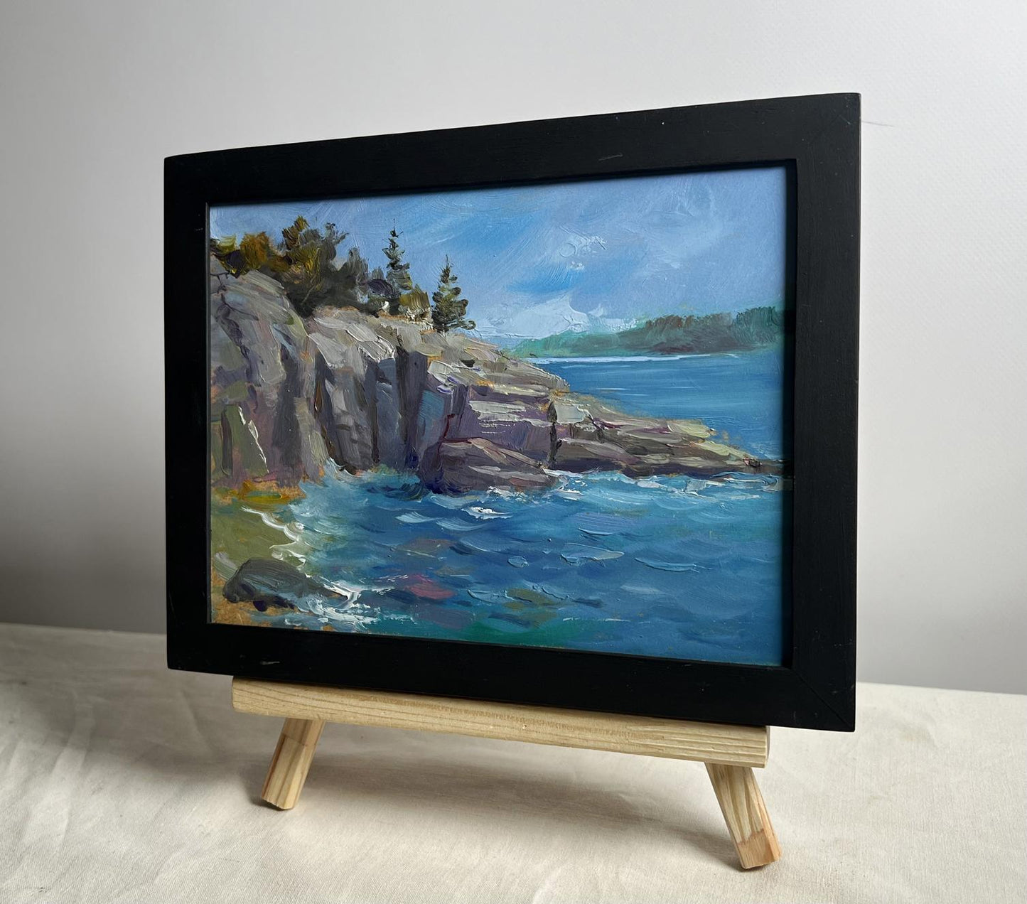 Framed oil painting Cloudy day at sea by Yuriy Suprunchuk, coastal cliffs
