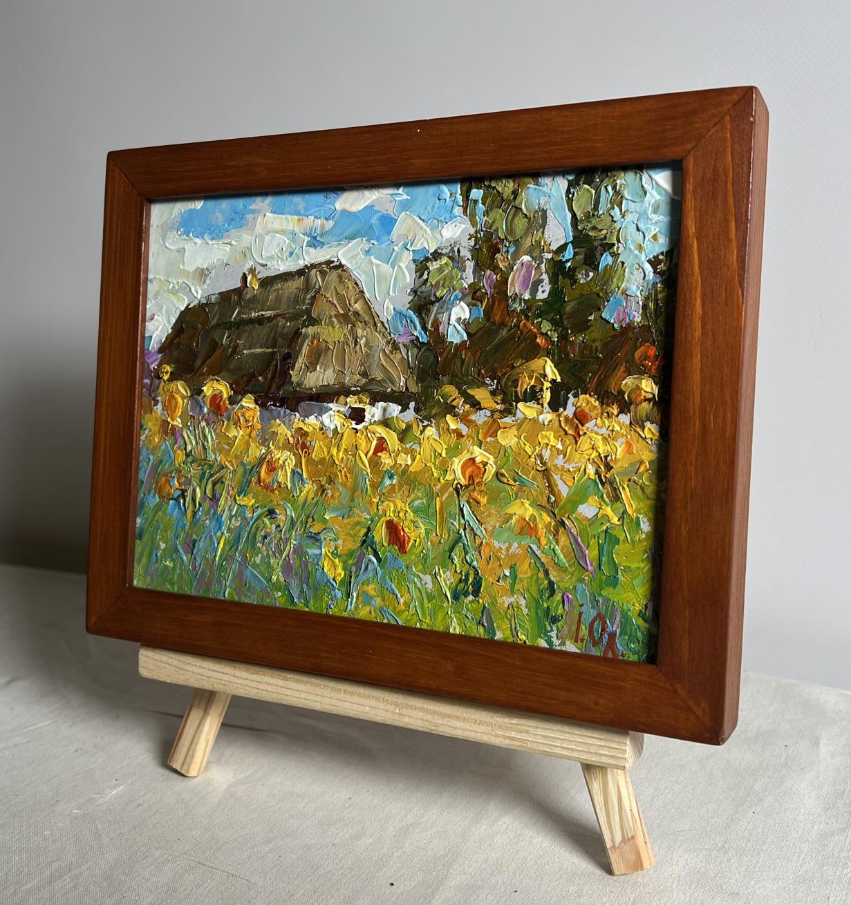 Rustic oil painting of thatched cottage and sunflowers by Oleksiy Ivanyuk