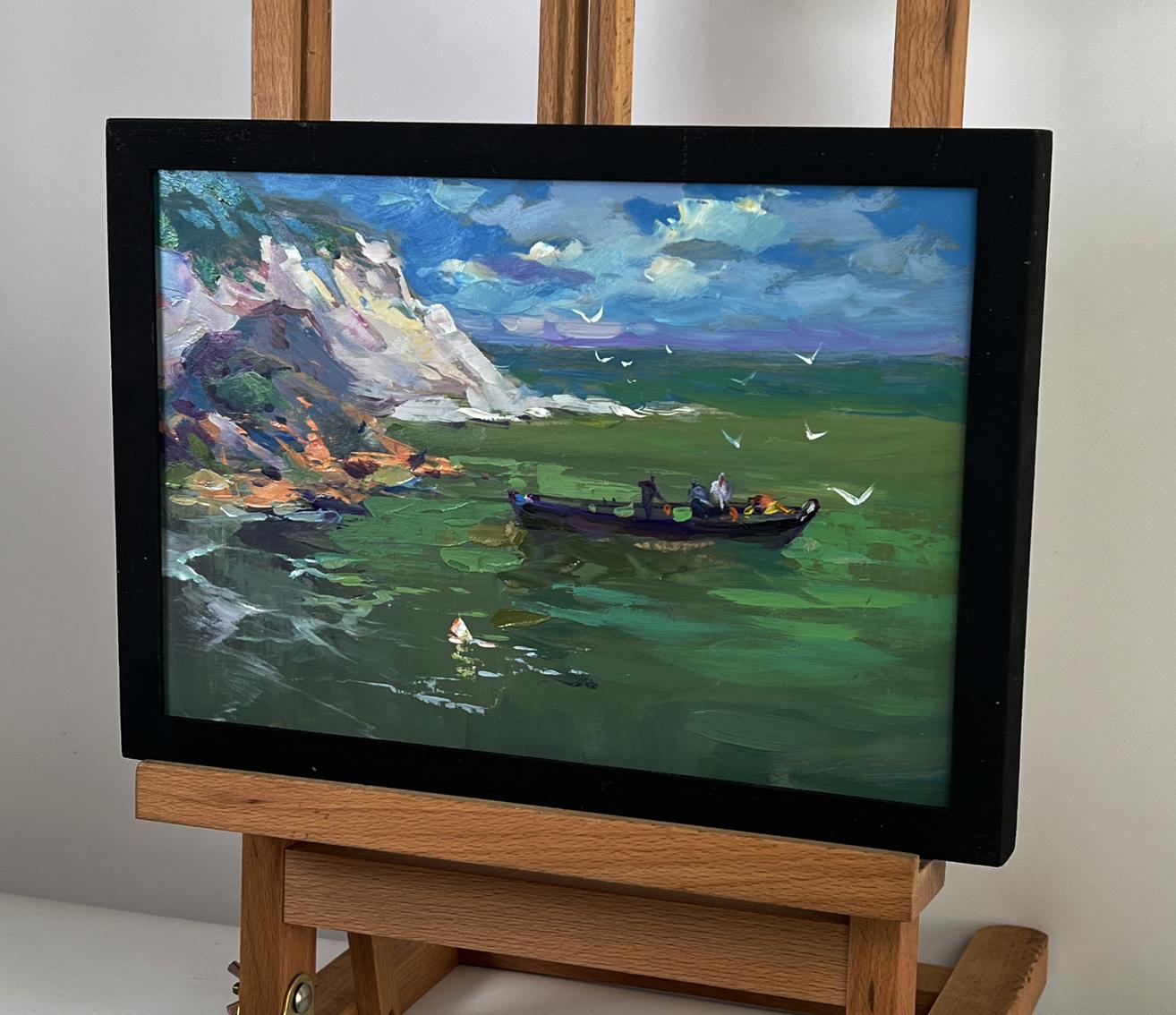 Oil painting of fishing boat at sea by Yuriy Suprunchuk, impressionist coastal scene