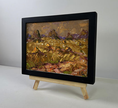Black-framed miniature oil painting A moment between light and darkness by Oleksiy Ivanyuk