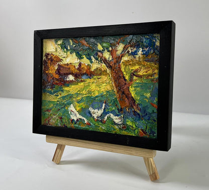 Vibrant impressionist oil painting In the shade of the trees by Oksana Ivanyuk, geese under tree in black frame
