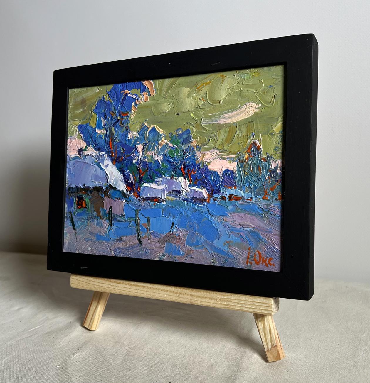 Oil painting Snowy village by Oksana Ivanyuk in black frame