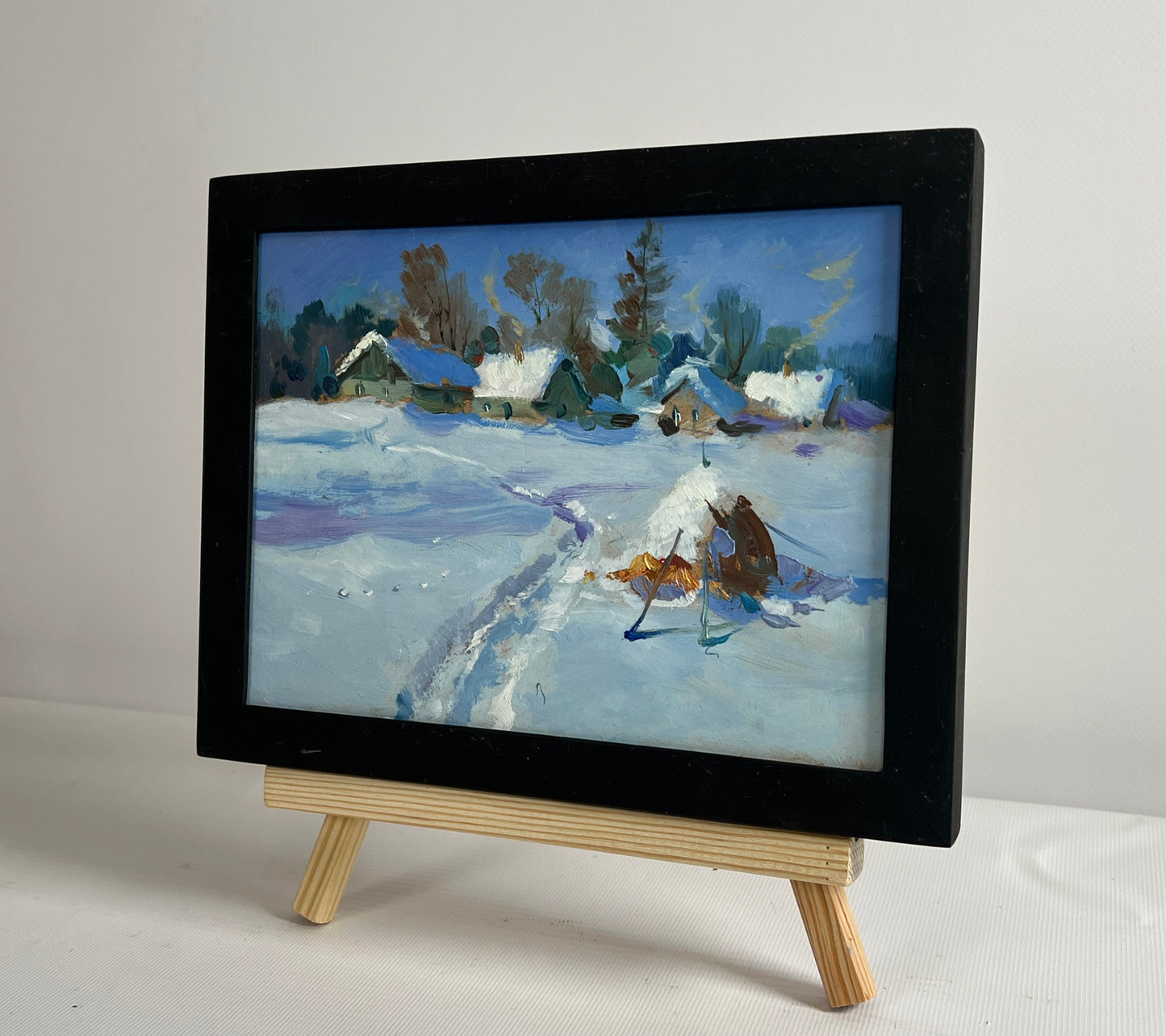 Oil painting Snowy path to the village by Yuriy Suprunchuk black-framed winter landscape