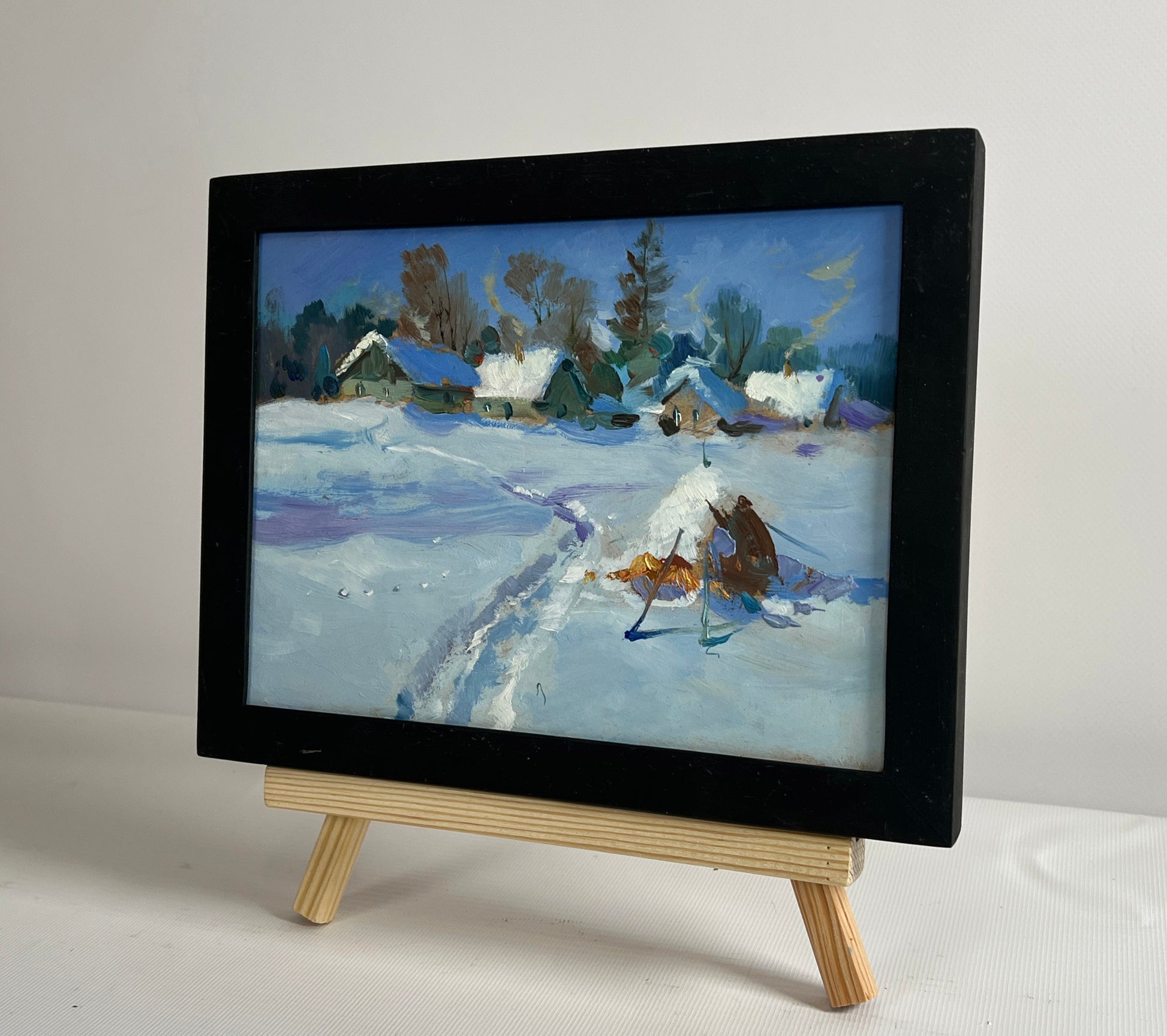 Oil painting Snowy path to the village by Yuriy Suprunchuk black-framed winter landscape