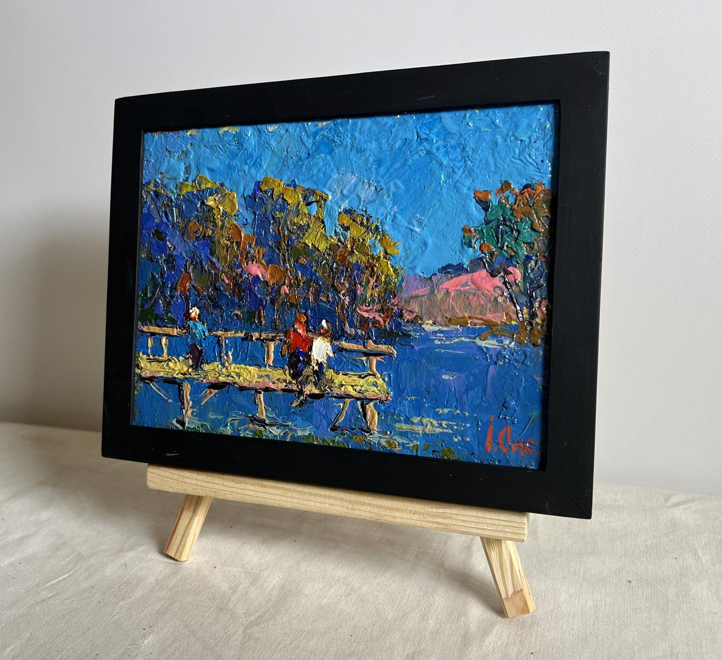 Oil painting Admiring the river by Oksana Ivanyuk on wooden easel