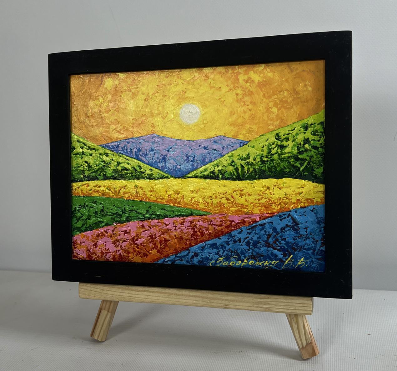Oil painting of evening sunlit sky over hills by V. Zadorozhnya in black frame