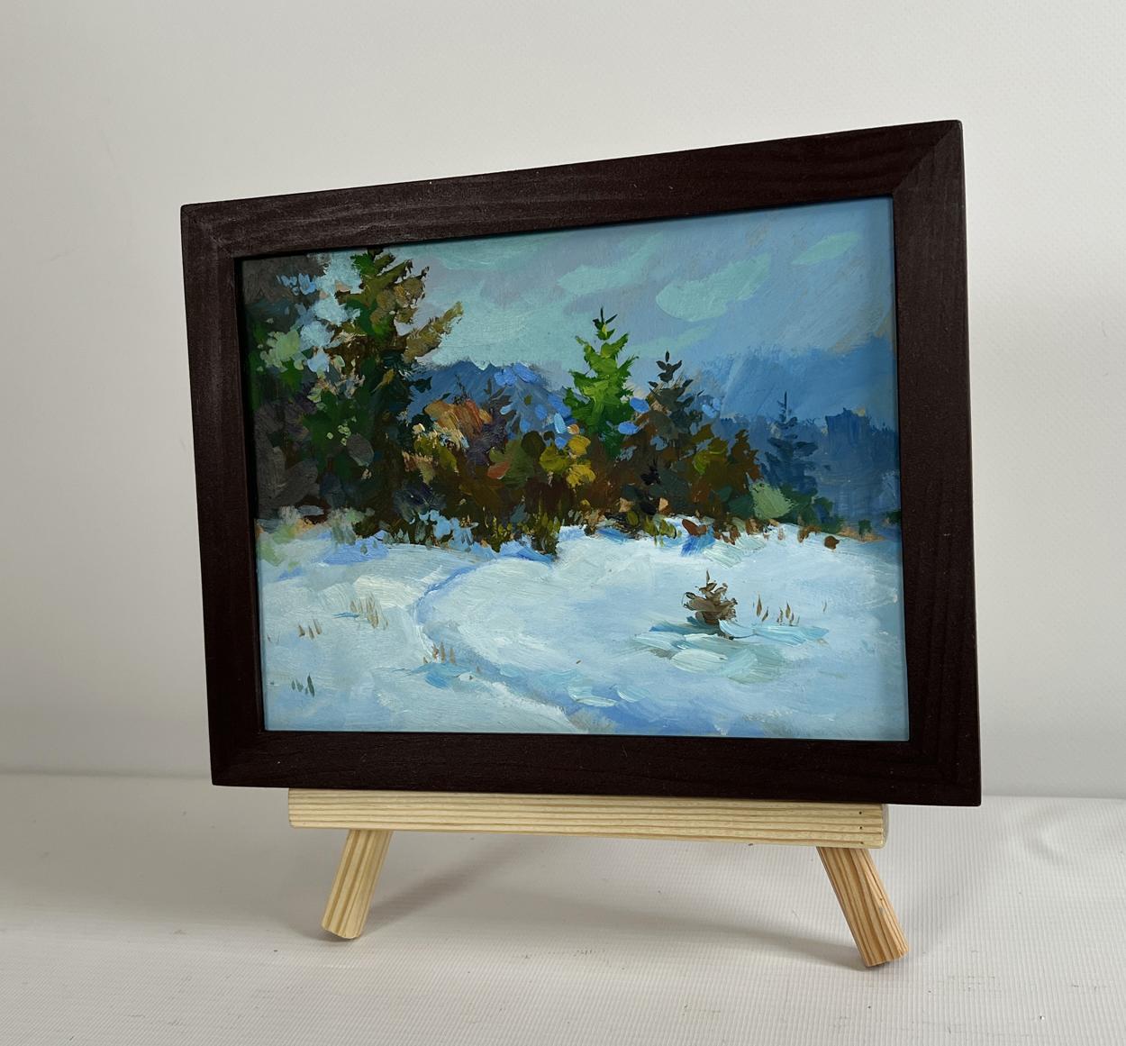 Oil painting In the snowy forest by Yuriy Suprunchuk on easel