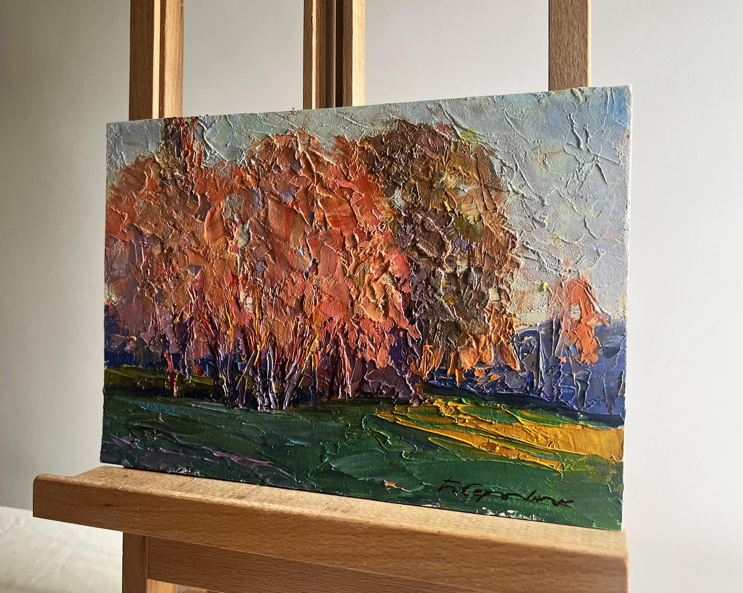 Oil painting Autumn evening in the forest by Boris Serdyuk on wooden easel