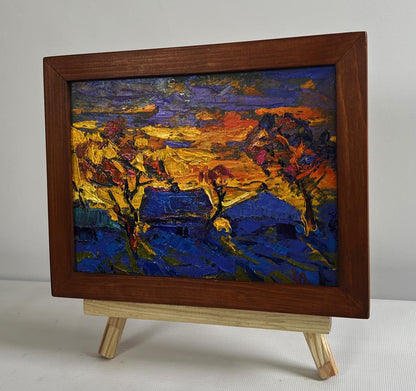 Oil painting A blazing evening in the village by Oleksiy Ivanyuk in brown frame