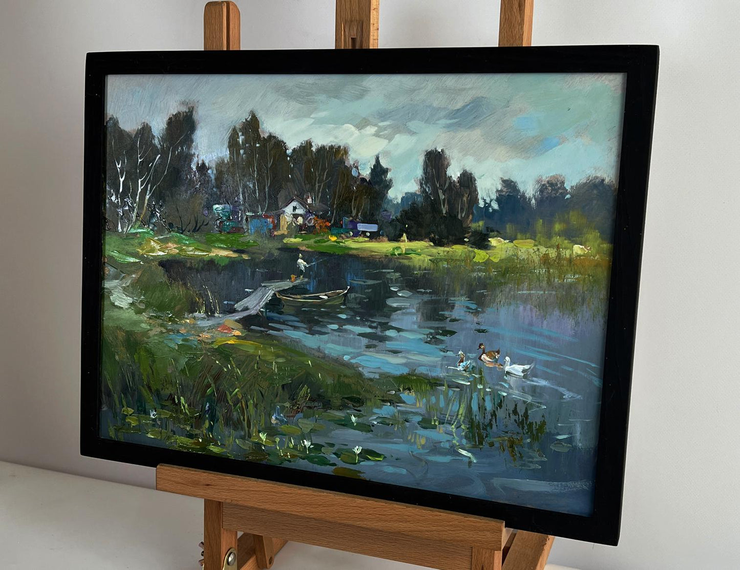 Framed oil painting of rural grey river with ducks by Yuriy Suprunchuk