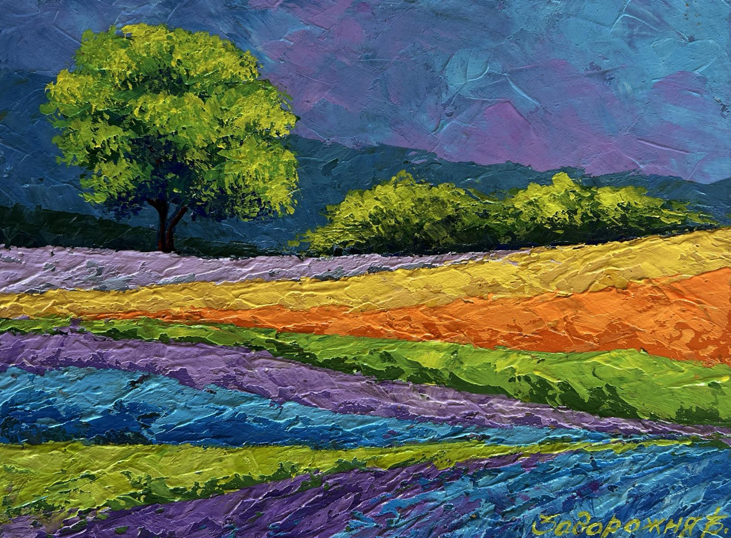 Vibrant impressionist oil painting by V. Zadorozhnya of green tree in lavender fields