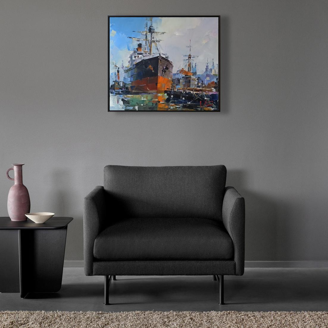 Dark gray upholstered armchair with black legs by Volodymyr Gluhomanyuk
