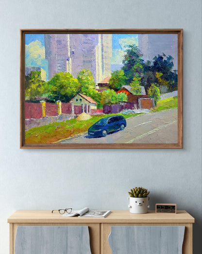 Framed oil painting Along the city street by Boris Serdyuk, blue car on tree-lined street