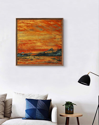 A square-framed abstract painting with vibrant orange and yellow brushstrokes depicting a sunset landscape, set in a wooden frame.