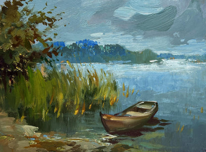 Oil painting of rustic rowboat among reeds by Yuriy Suprunchuk