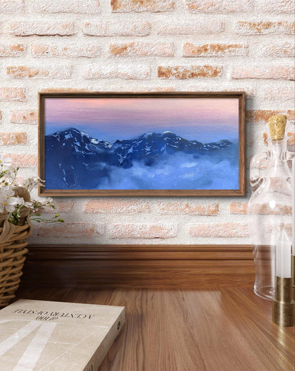 Oil painting Snowy mountains Tatyana Derdey on white brick wall