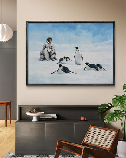 Oil painting of Inuit man and penguins by Oleg Kateryniuk in black frame
