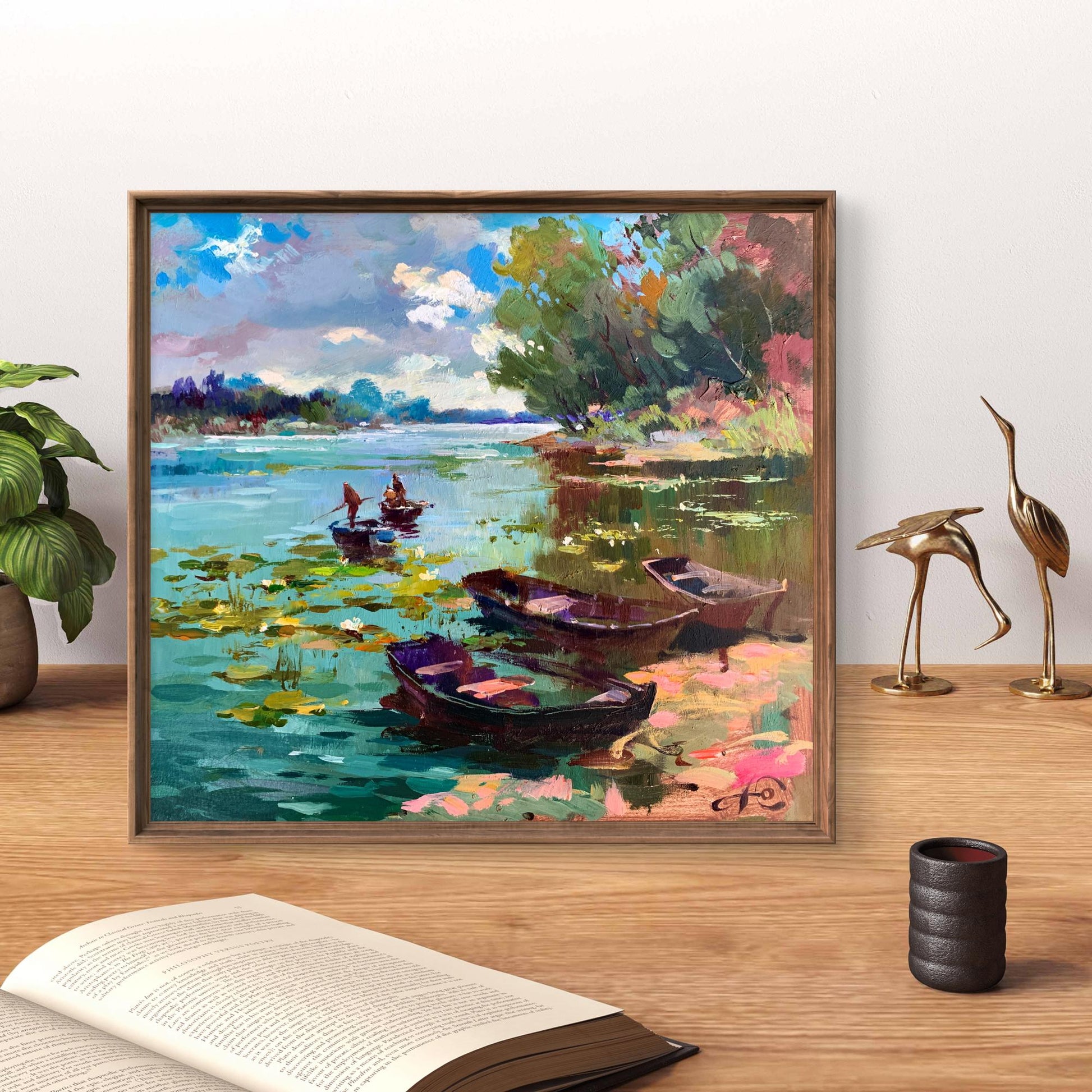 Framed impressionist oil painting of boats on lily pad lake by Yuriy Suprunchuk