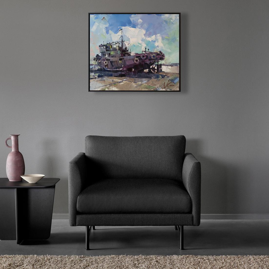 Dark gray upholstered armchair with black metal legs by Volodymyr Gluhomanyuk