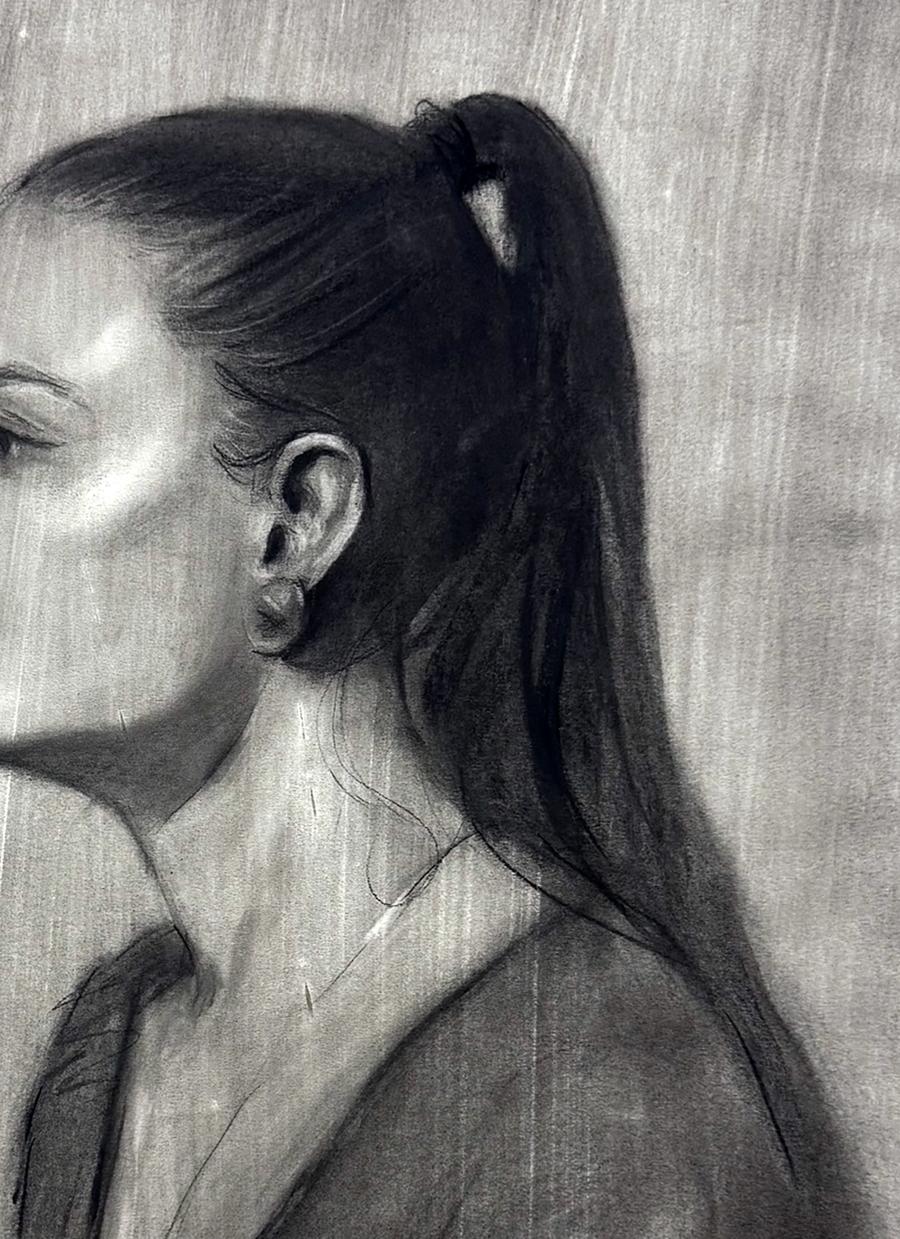 Charcoal portrait sketch of Persephone Annam Butt profile view