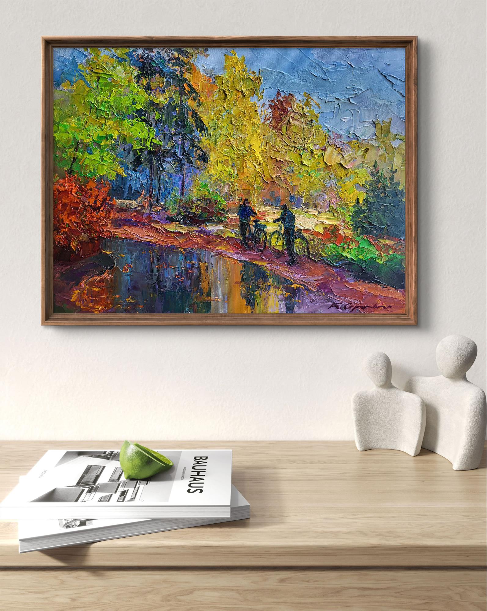 Vibrant impressionist oil painting by Boris Serdyuk of cyclists on autumn path in rustic frame