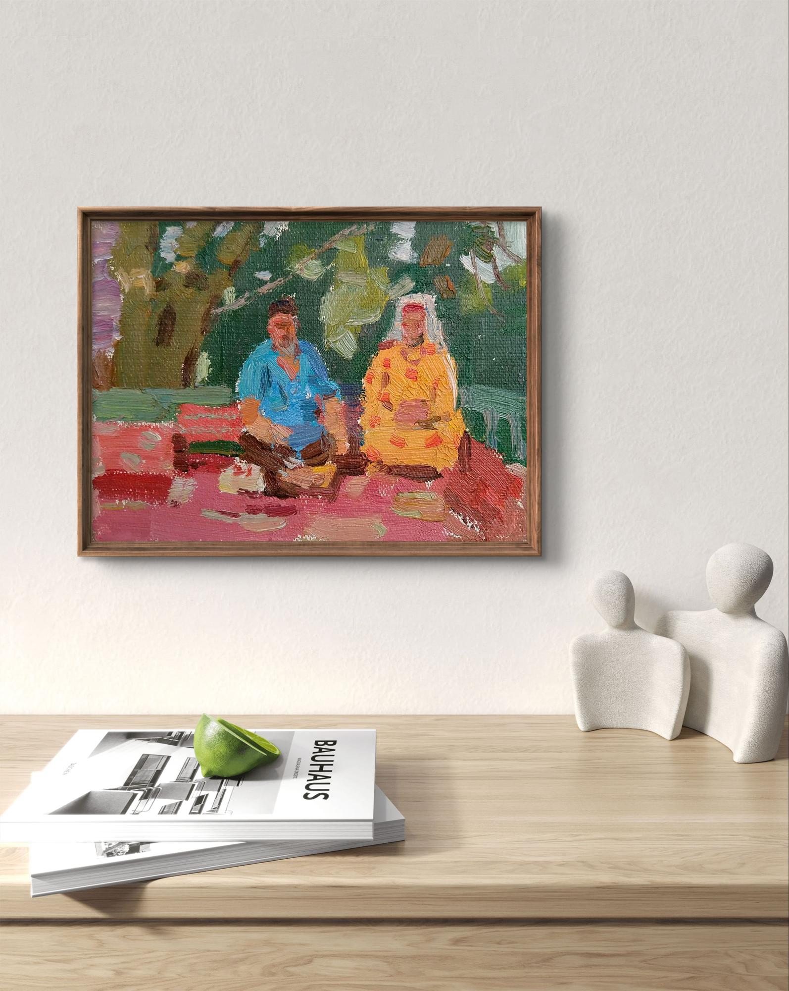 Oil painting Tea party by Yury Konovalov, two figures on red blanket under trees