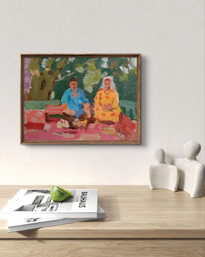 Oil painting Tea party by Yury Konovalov, two figures on red blanket under trees