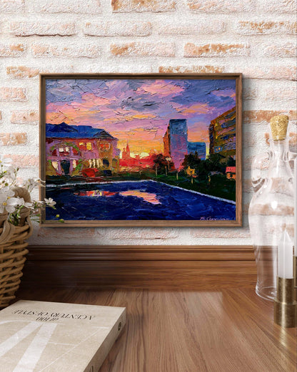 Oil painting of city orange sunset by Boris Serdyuk in wooden frame