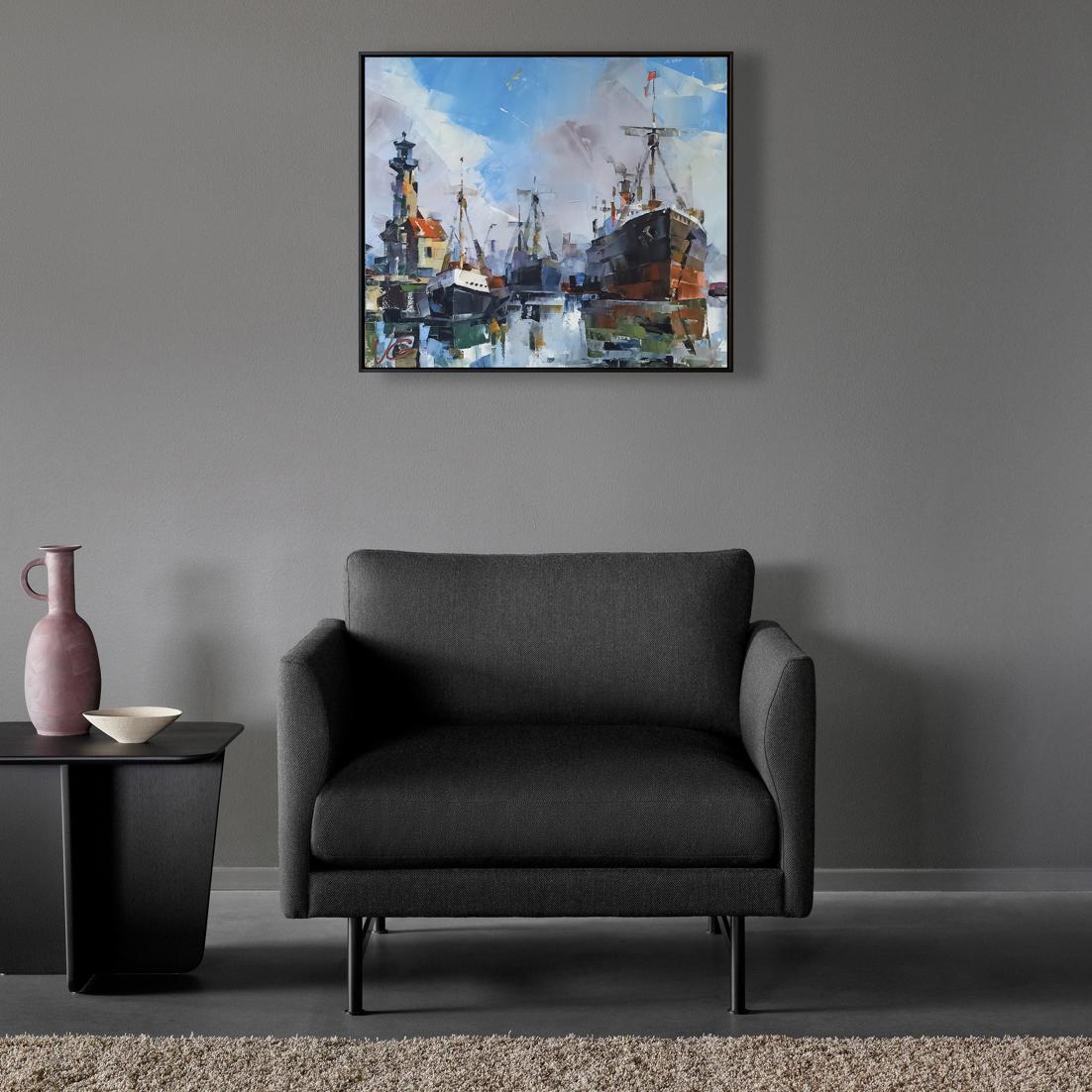 Dark gray upholstered armchair with black metal legs in Oil painting At the old lighthouse Volodymyr Gluhomanyuk