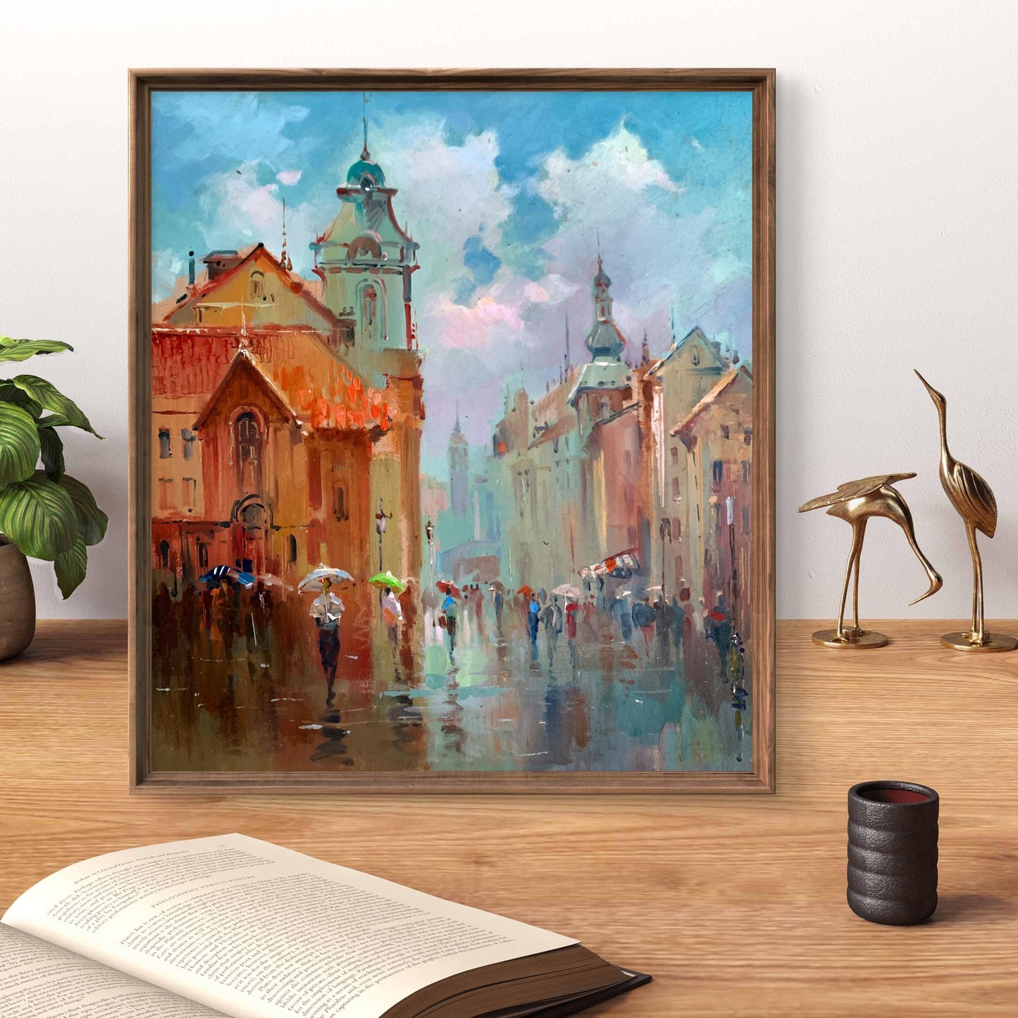 Framed impressionist oil painting by Yuriy Suprunchuk of rainy European street