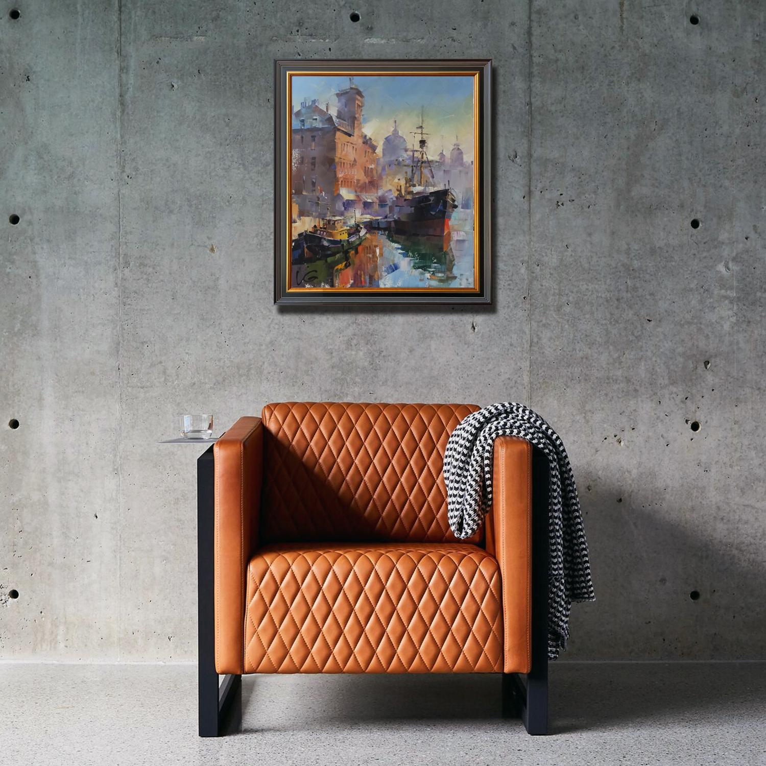 Tan leather diamond-quilted armchair with black metal legs by Volodymyr Gluhomanyuk