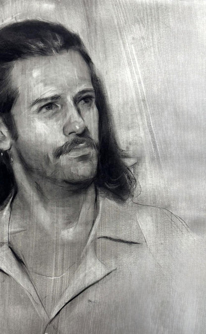 Detailed grayscale charcoal portrait sketch of Alessio Annam Butt