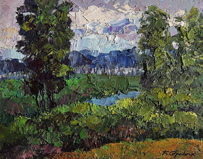 Oil painting It’s getting dark by Boris Serdyuk: lush green trees, blue mountains