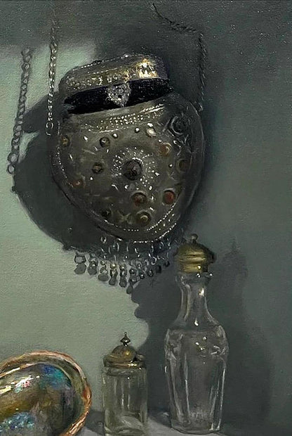 Silver ornate pouch with gems, beads in Annam Butt pearl glass still life