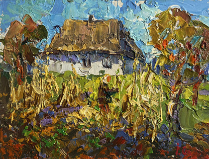 Oil painting Autumn gardening time by Oleksiy Ivanyuk: rustic white thatched house in autumn fields