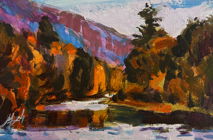 Vibrant autumn lake painting by Mykhailo Patskan, fiery trees and mountains