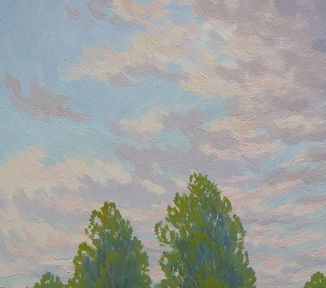 Oil painting by Valery Savenets: pastel sky with clouds above tall green trees