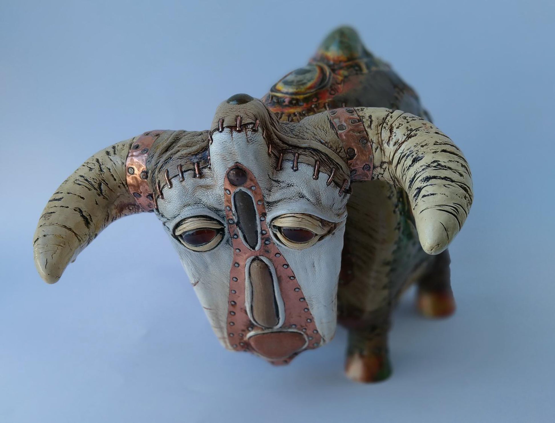 Handcrafted ceramic ram figurine in Big Bull casket by Dmytro Kravtsov