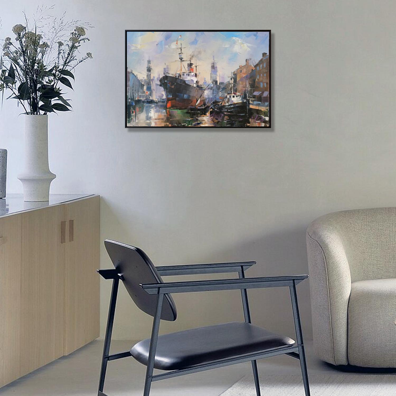 Black metal-framed armchair with black leather seat by Volodymyr Gluhomanyuk