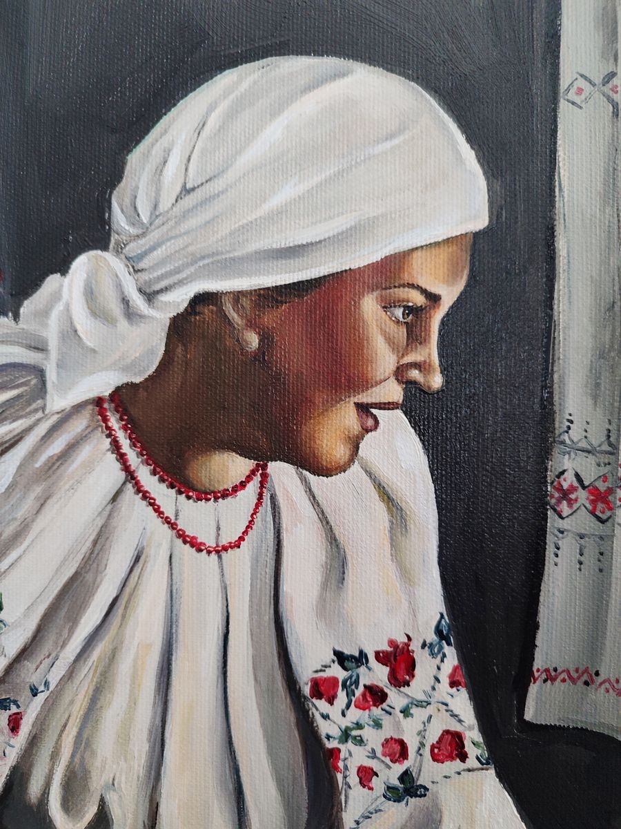 Oil painting of Grandma making pies by Oksana Sklym in white embroidered blouse
