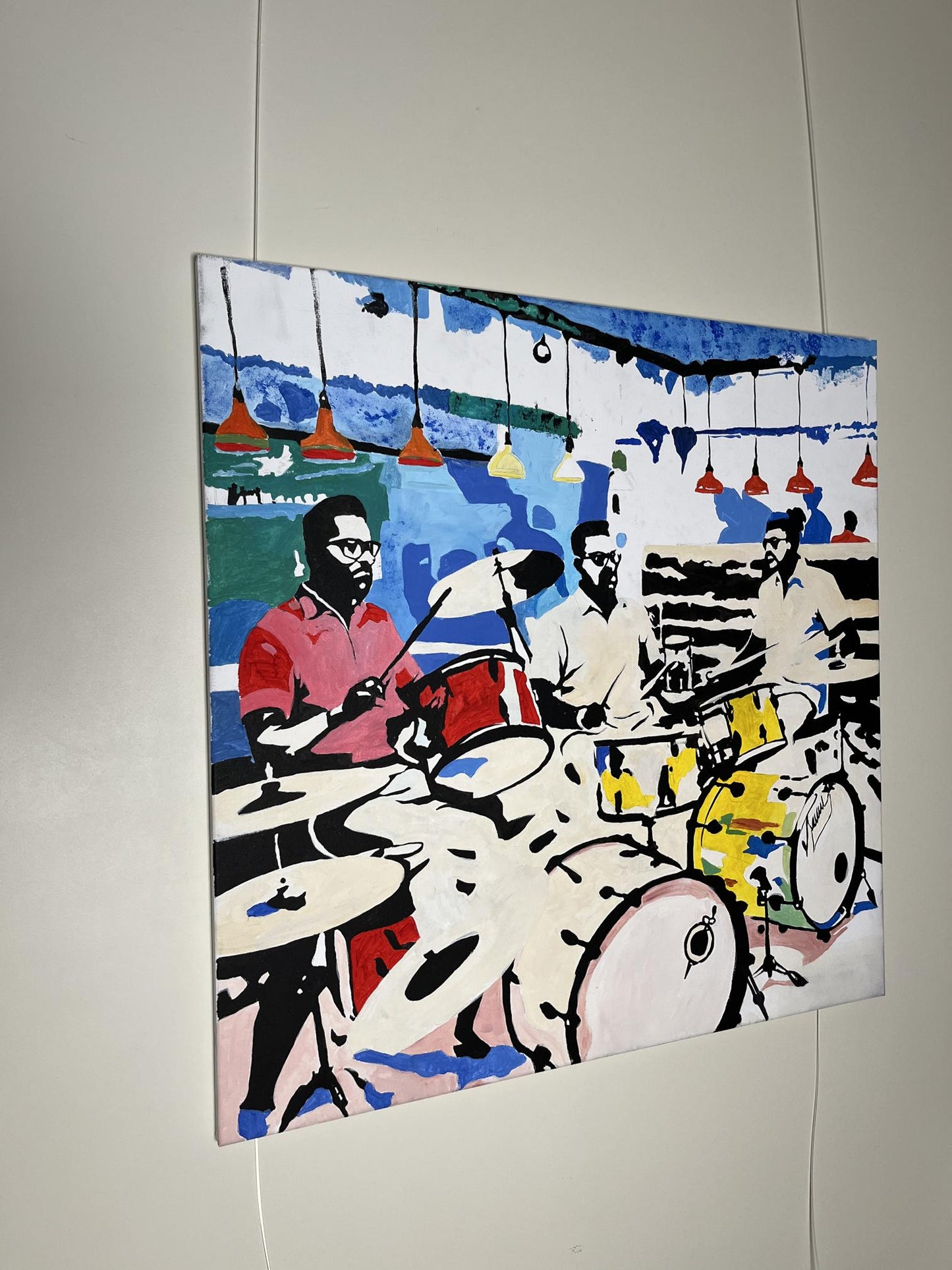 Vibrant pop-art drum set by Arturo Banks in jazz cafe scene