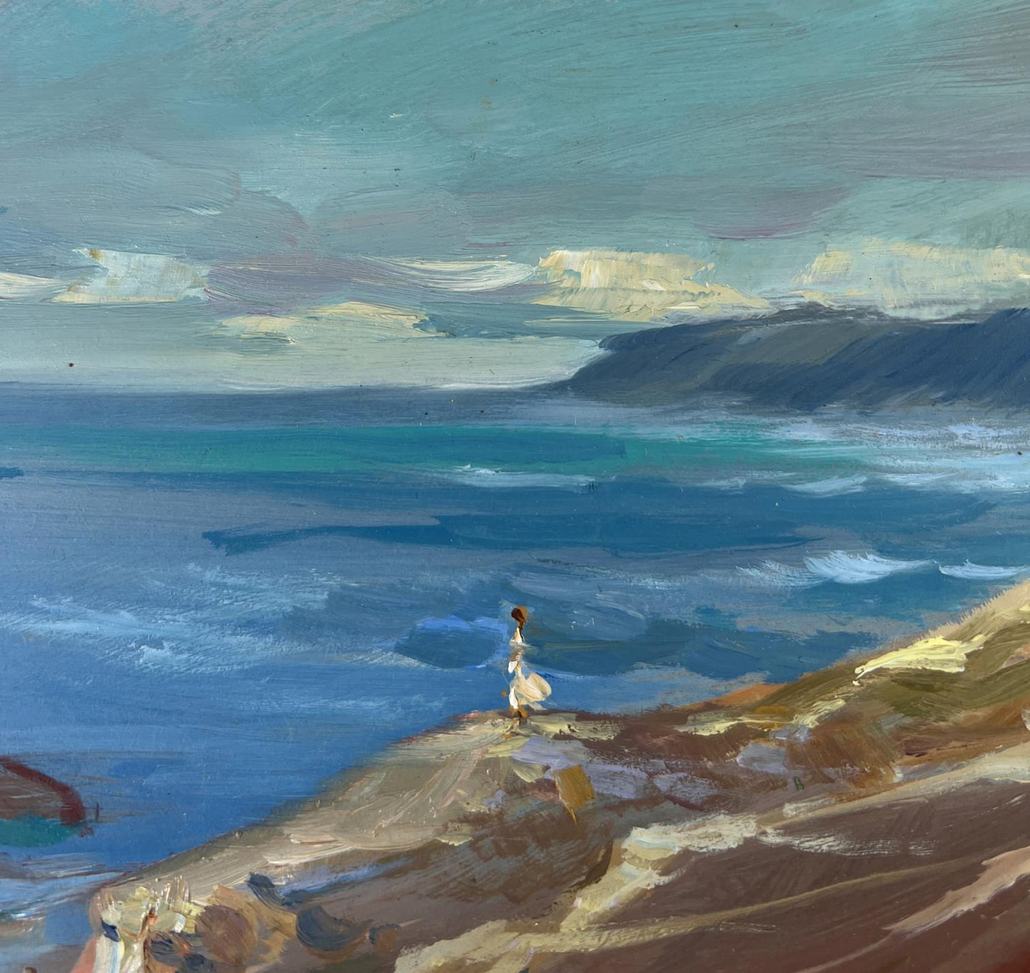 Oil painting Between the sky and the sea by Yuriy Suprunchuk: figure on cliff over ocean