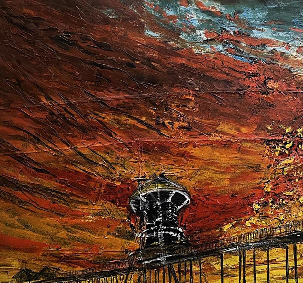 A black and white water tower stands prominently against a vibrant, textured sky painted in fiery reds, oranges, and deep browns.