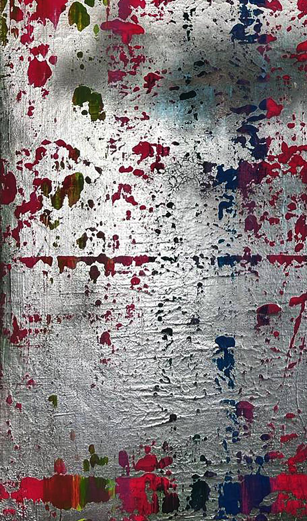 Silver metallic surface with colorful paint splatters by Olga Melezhik