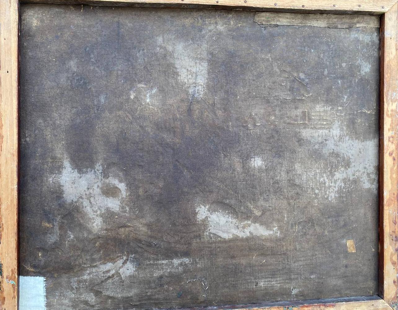 Back of framed oil painting of people relaxing by river, aged textured canvas